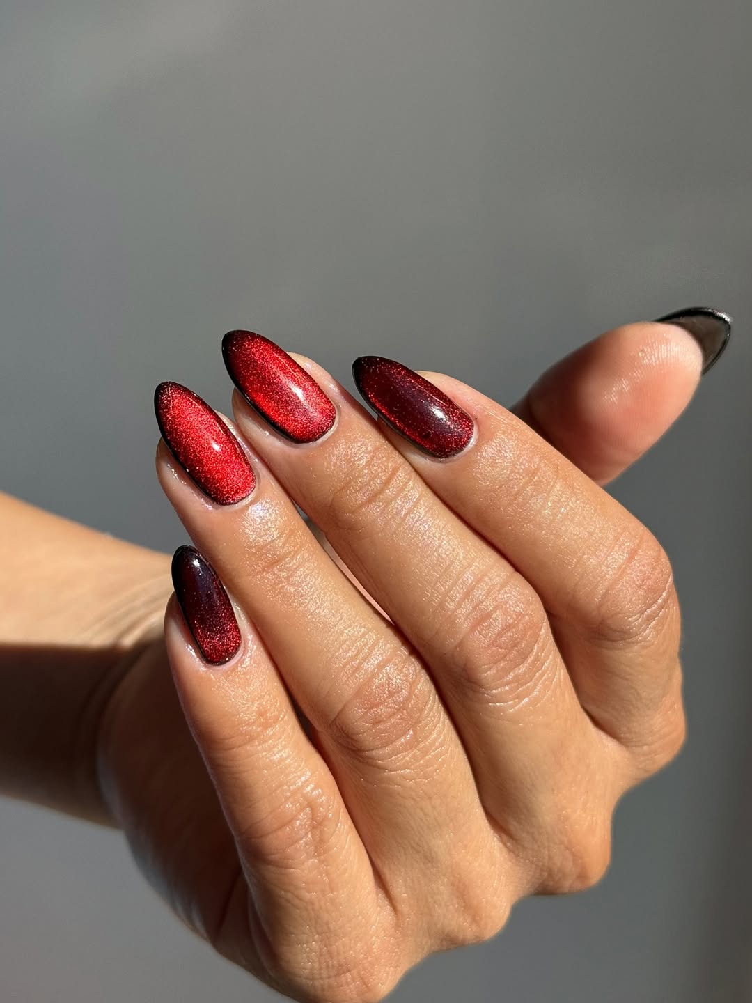A red velvet manicure by Queenie Nguyen