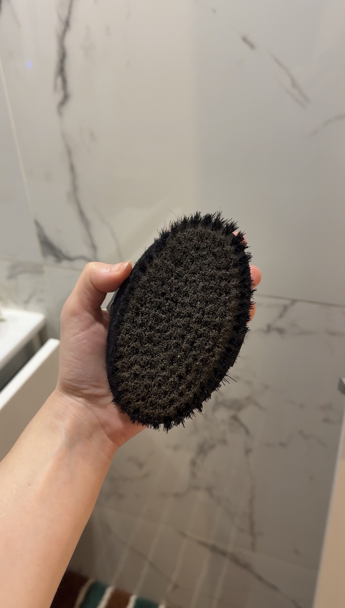 Jamie Schneider using a dry brush