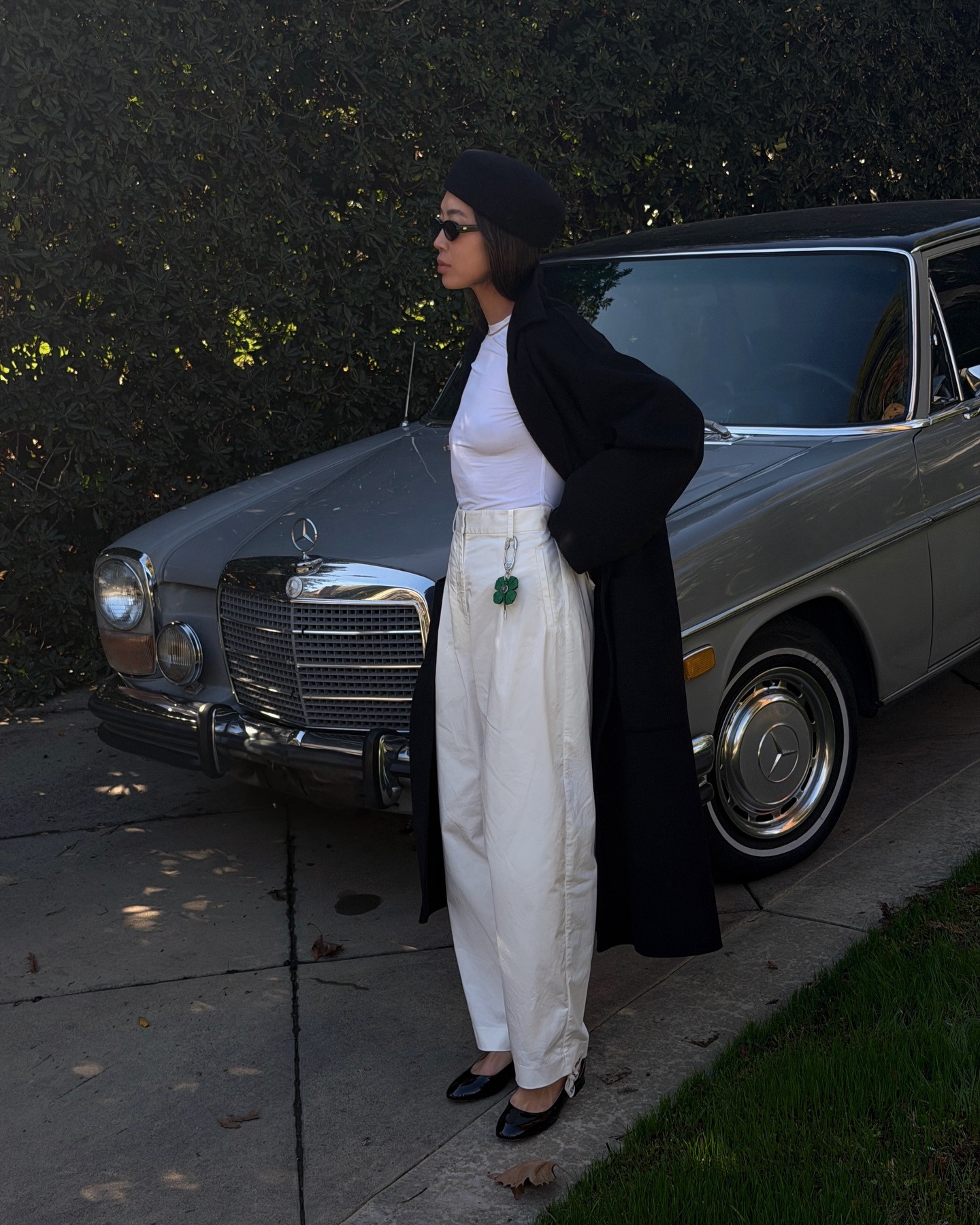 Photos of Aimee Song wearing the new Jonathan Anderson for Dior J'Adior patent leather ballet flats from the spring/summer 2026 collection.