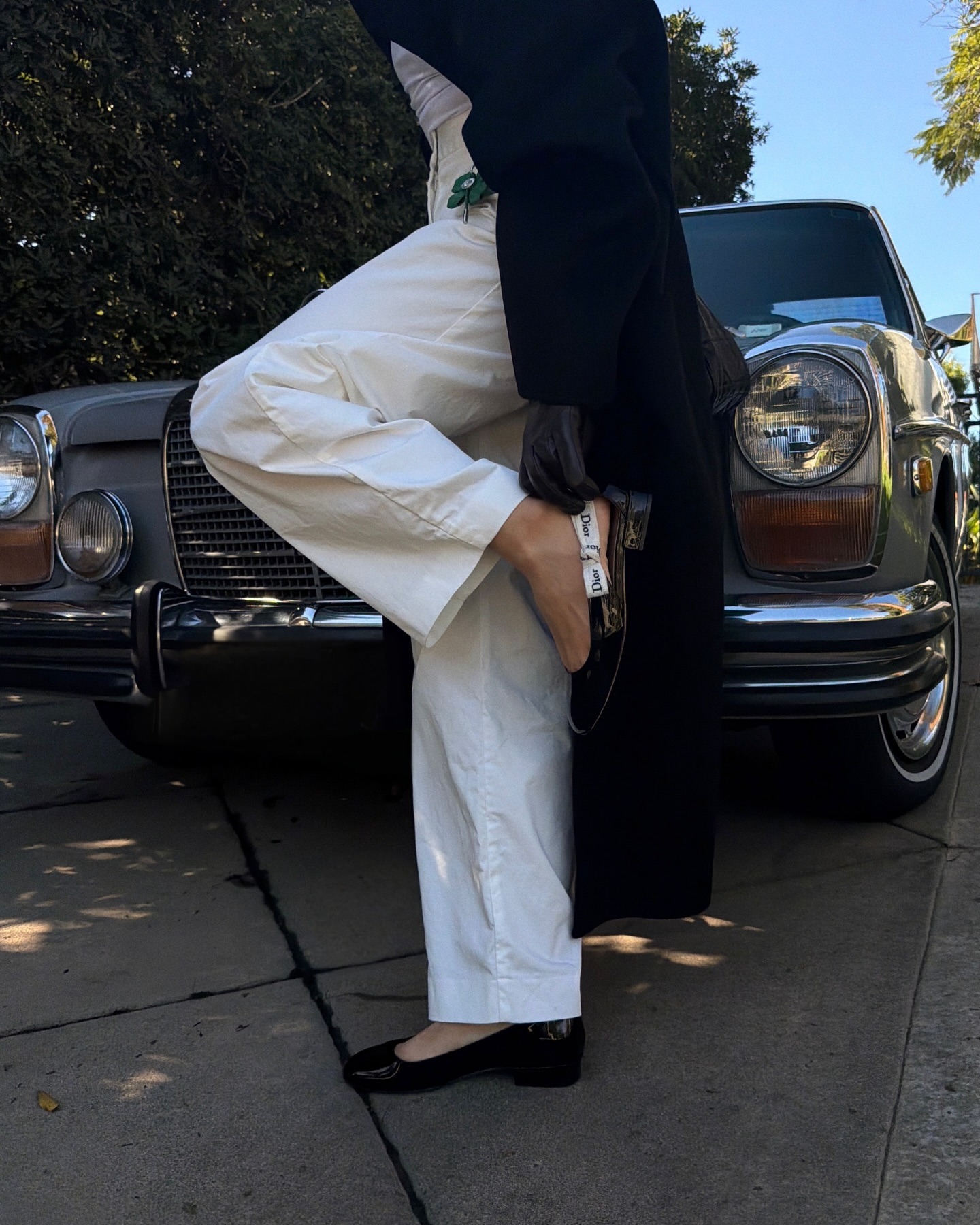 Photos of Aimee Song wearing the new Jonathan Anderson for Dior J'Adior patent leather ballet flats from the spring/summer 2026 collection.