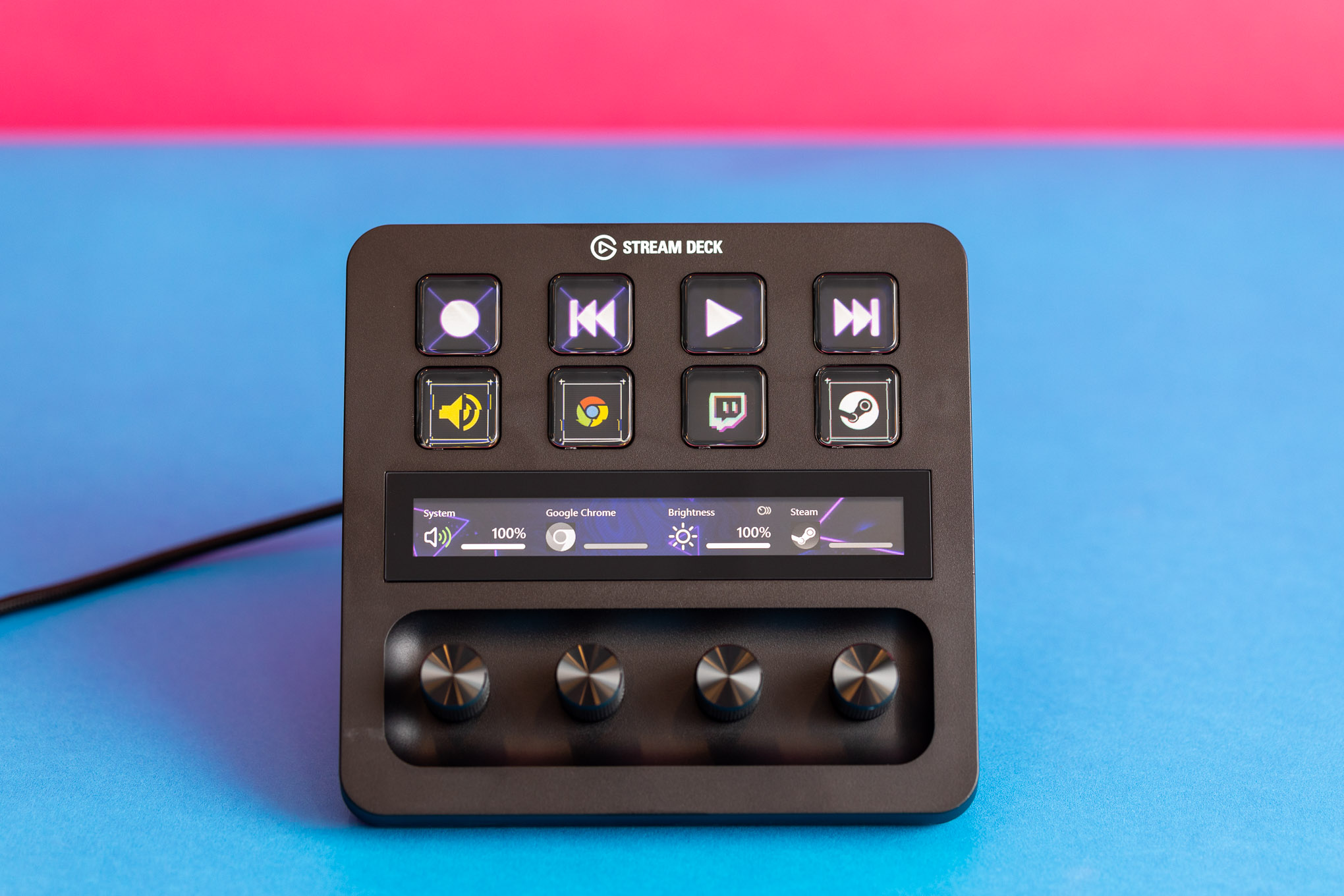 Elgato Stream Deck Plus pictured against colorful background