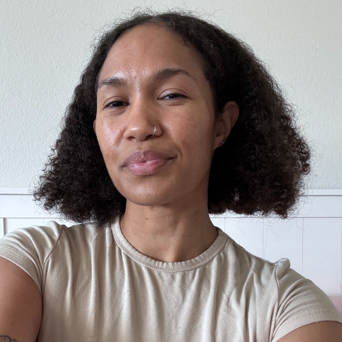 A beauty editor wearing L'Or&amp;eacute;al's Iron Sleek haircare collection