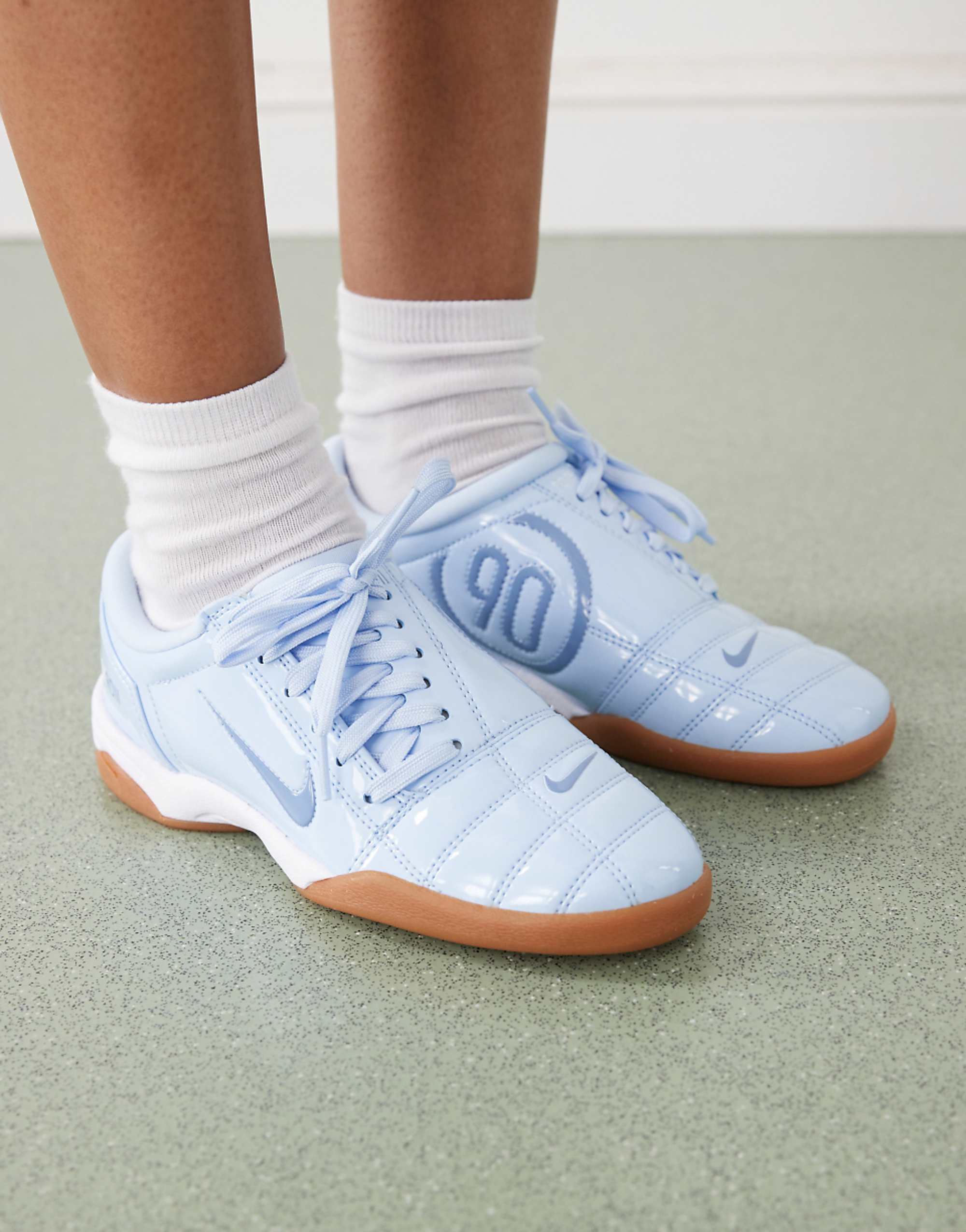 Nike T90 Patent Trainers in Light Blue