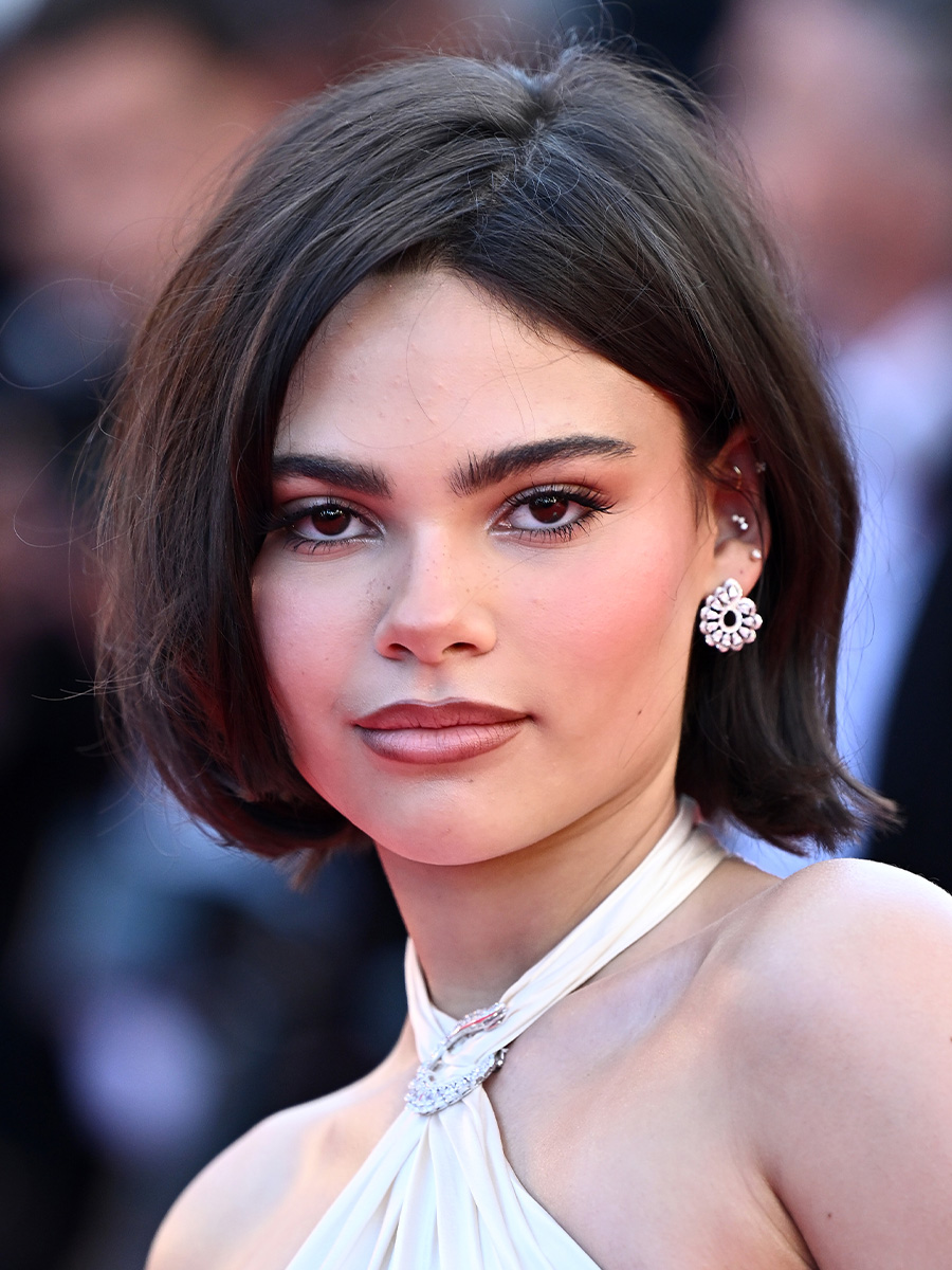 Ariana Greenblatt attends the "Dossier 137" red carpet at the 78th annual Cannes Film Festival with a blunt bob