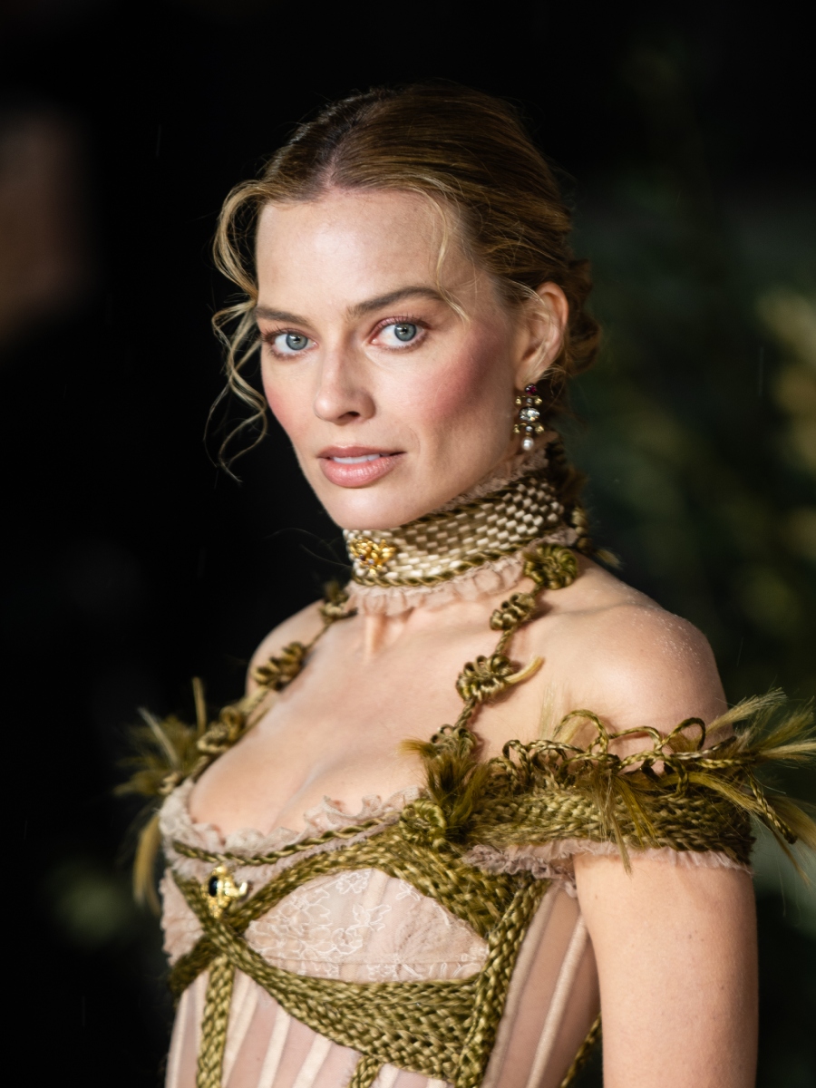Margot Robbie attends the "Wuthering Heights" UK Premiere with an Edwardian-inspired bun featuring fame-framing curls