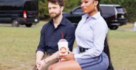 Megan Thee Stallion Flirts With Daniel Radcliffe In New Trailer For ‘The Fall and Rise of Reggie Dinkins’