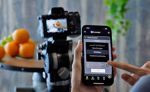 Tamron’s new dongle lets you wirelessly control your lens from your phone