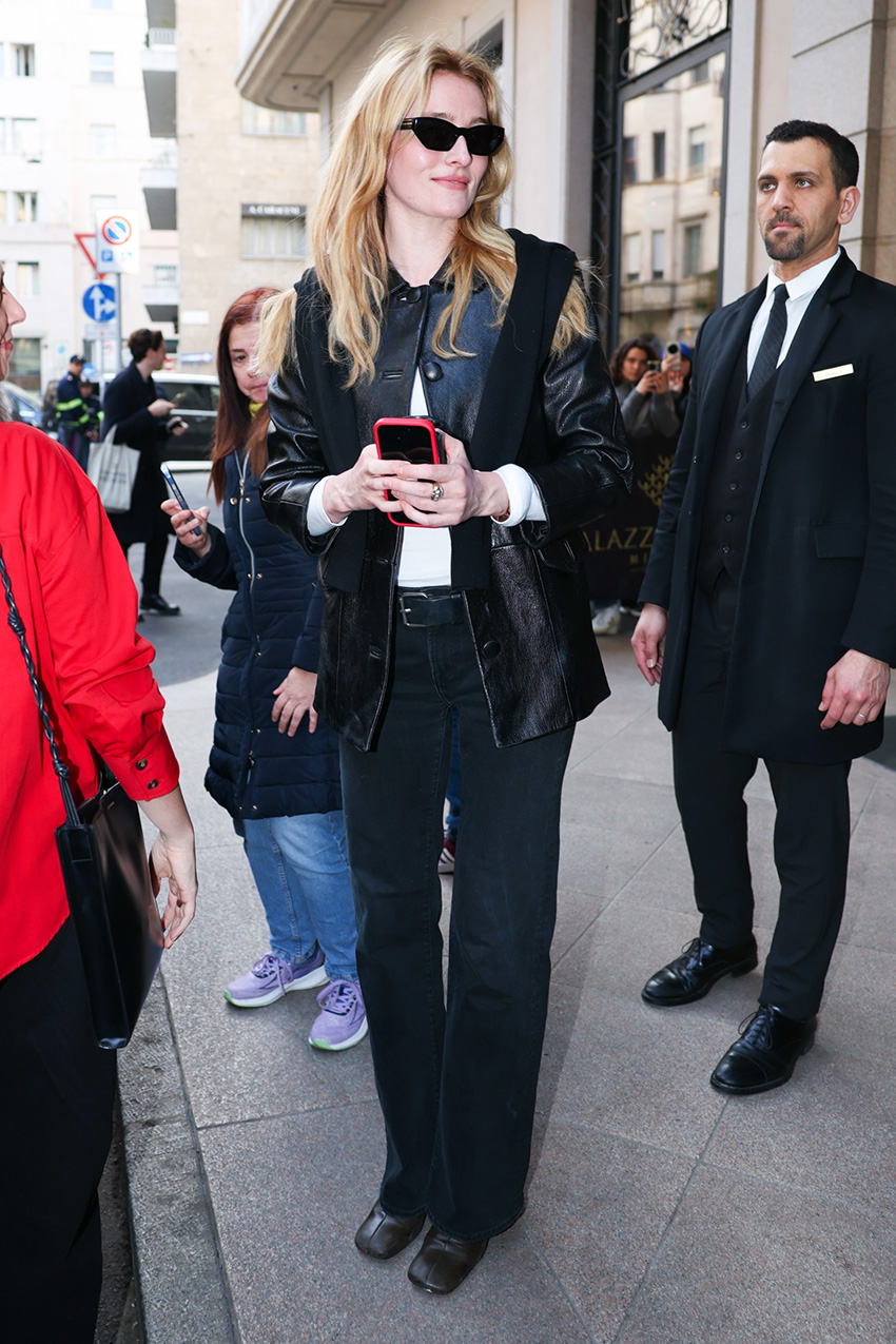 Sarah Pidgeon wearing a leather jacket, white T-shirt, black jeans, and high-vamp shoes during Milan Fashion Week