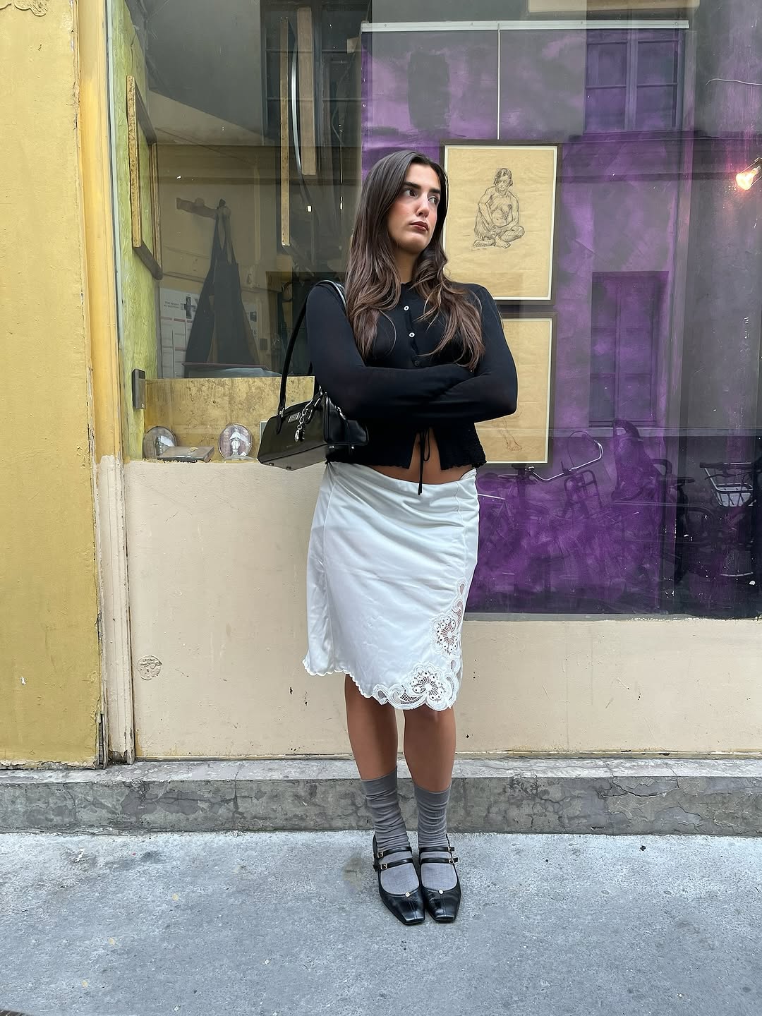 woman wearing winter to spring transitional capsule wardrobe 2026