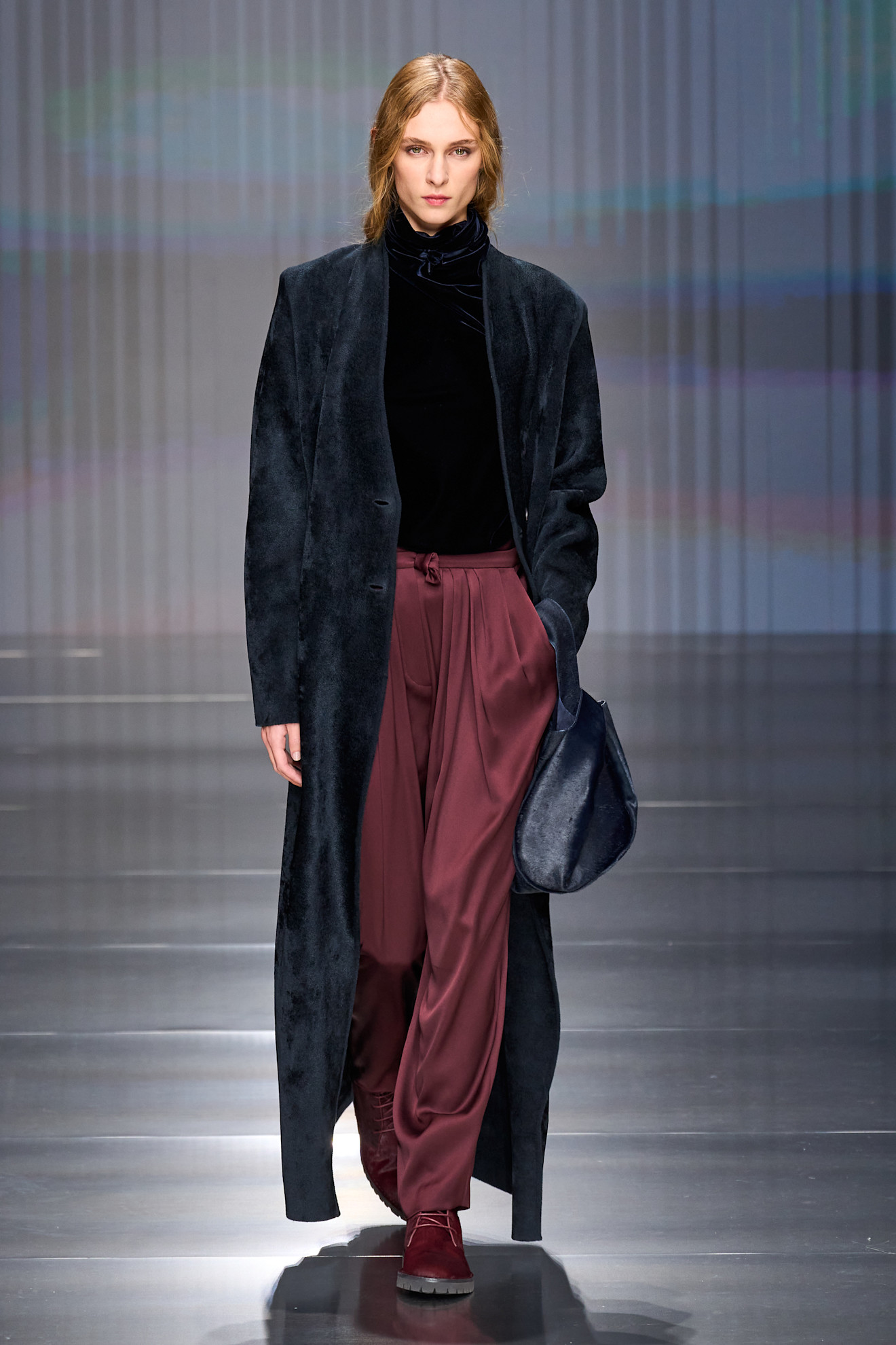 a model walks the runway during giorgio armani fall/winter 2026.