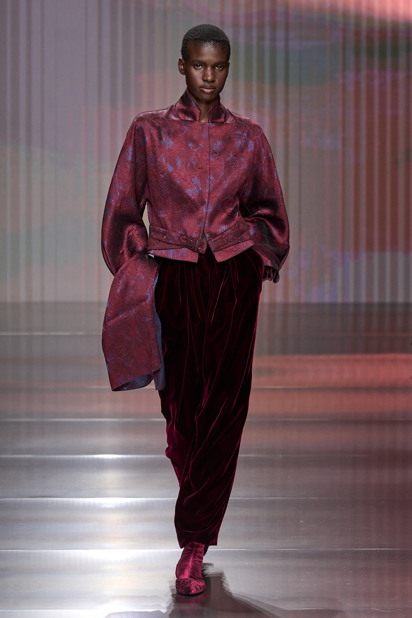 a model walks the runway during giorgio armani fall/winter 2026.