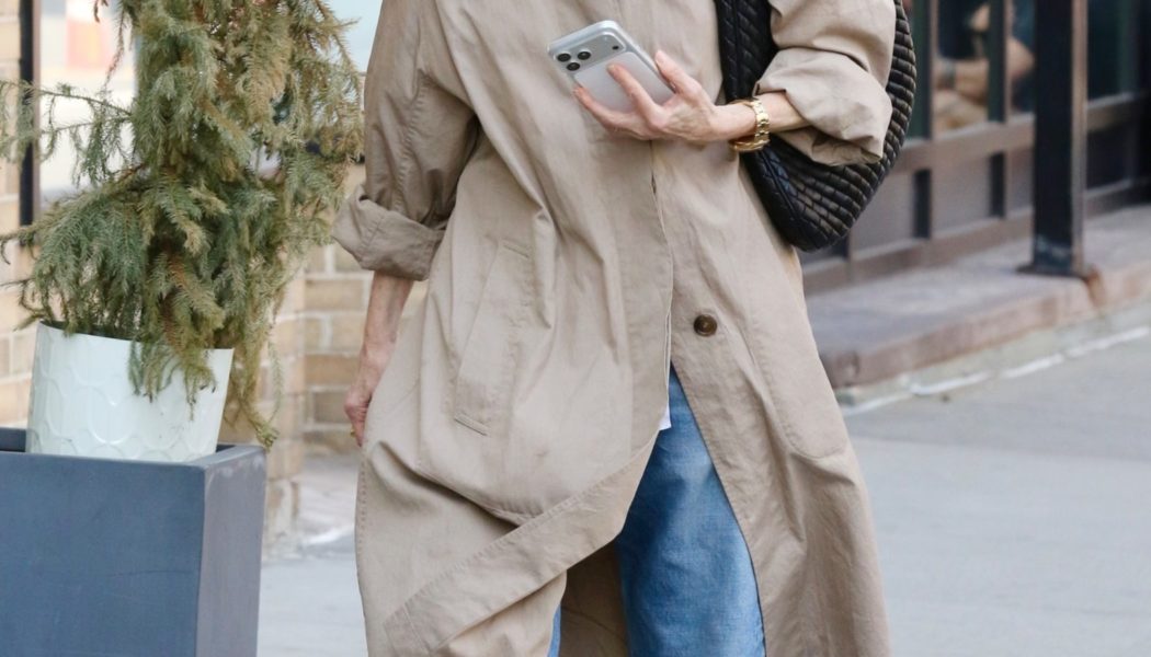 Celebs in Their 60s Are Styling Jeans With This One Sneaker Color Trend