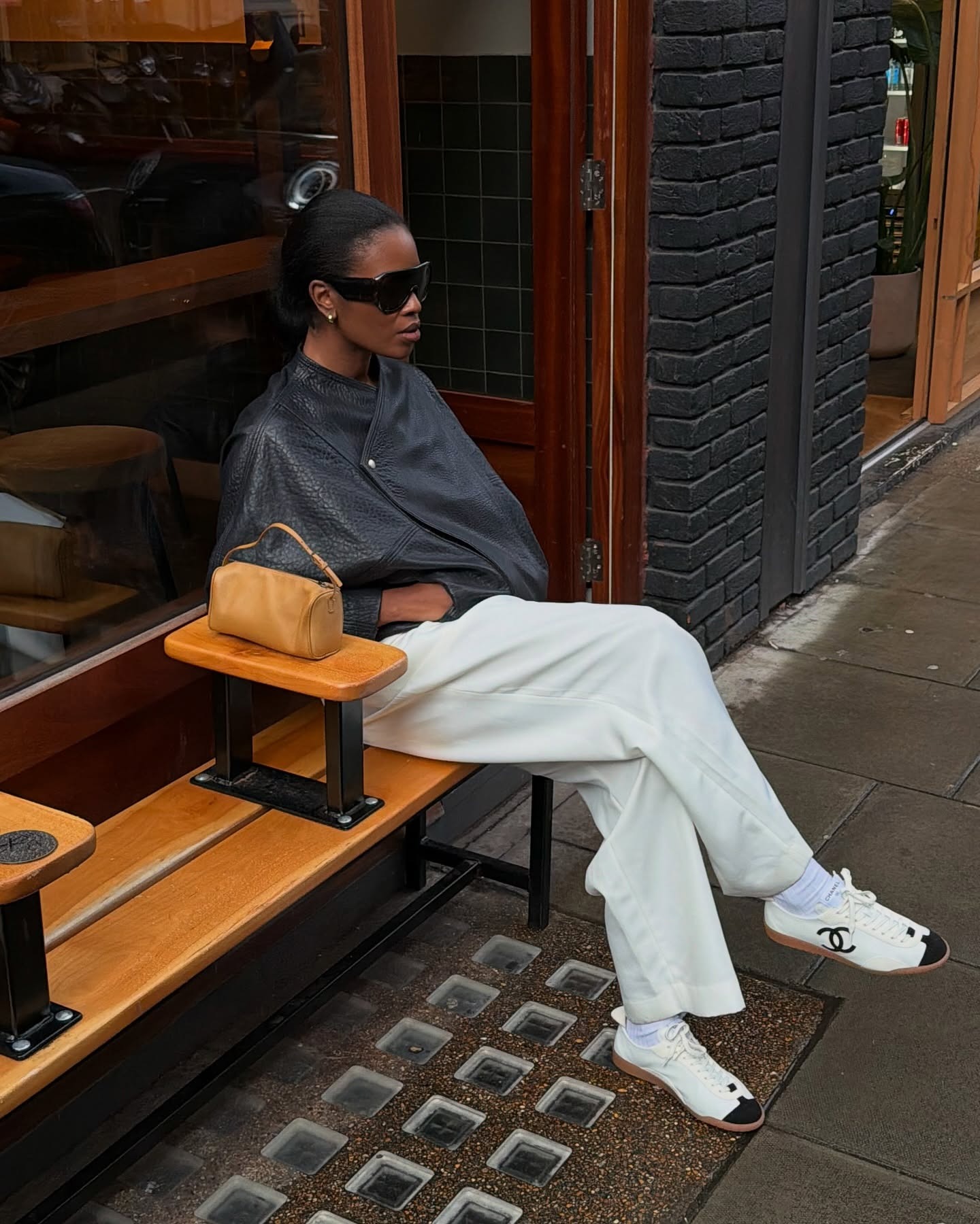Chic European in Chanel sneakers