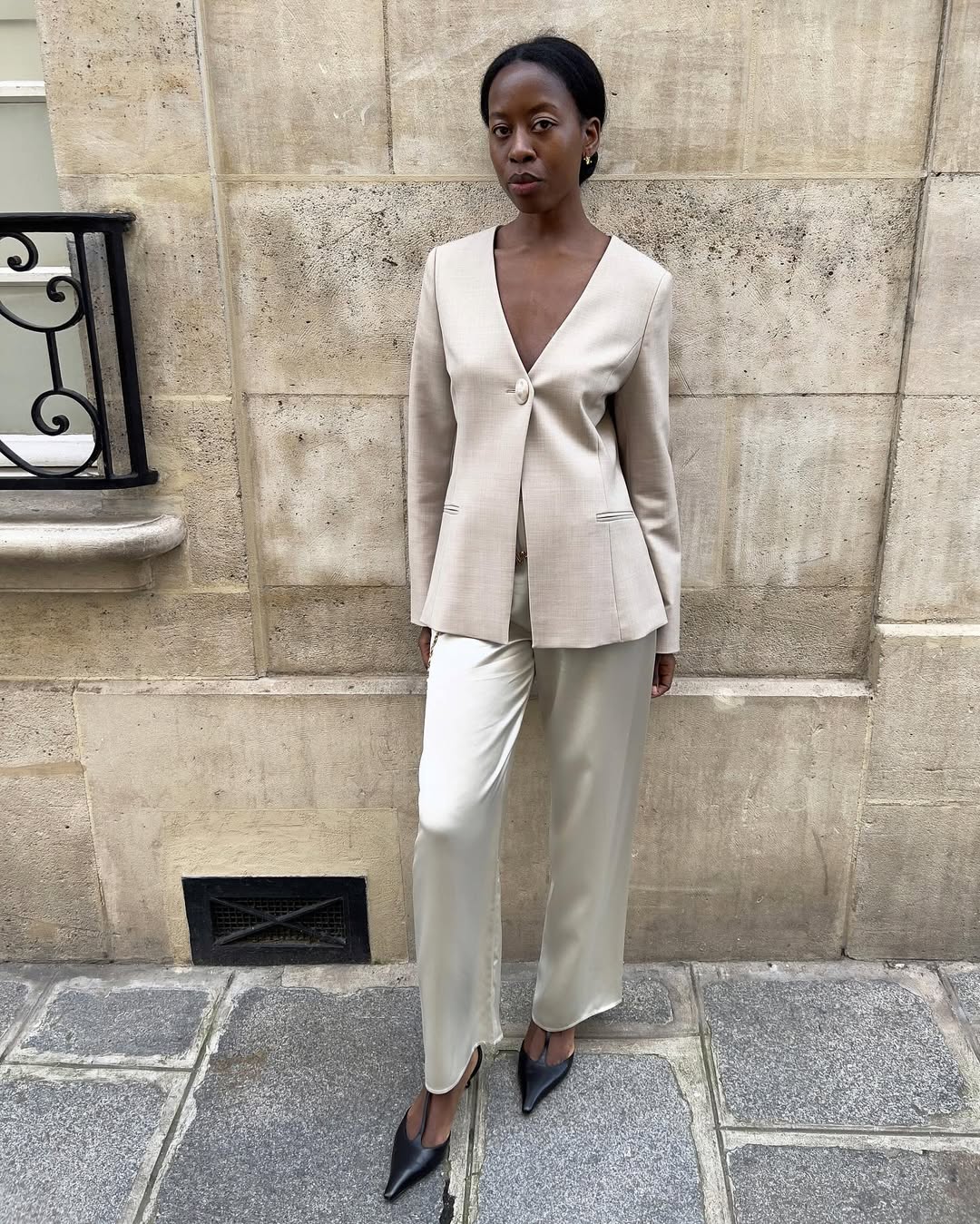 Sylvie in beige and silk trousers