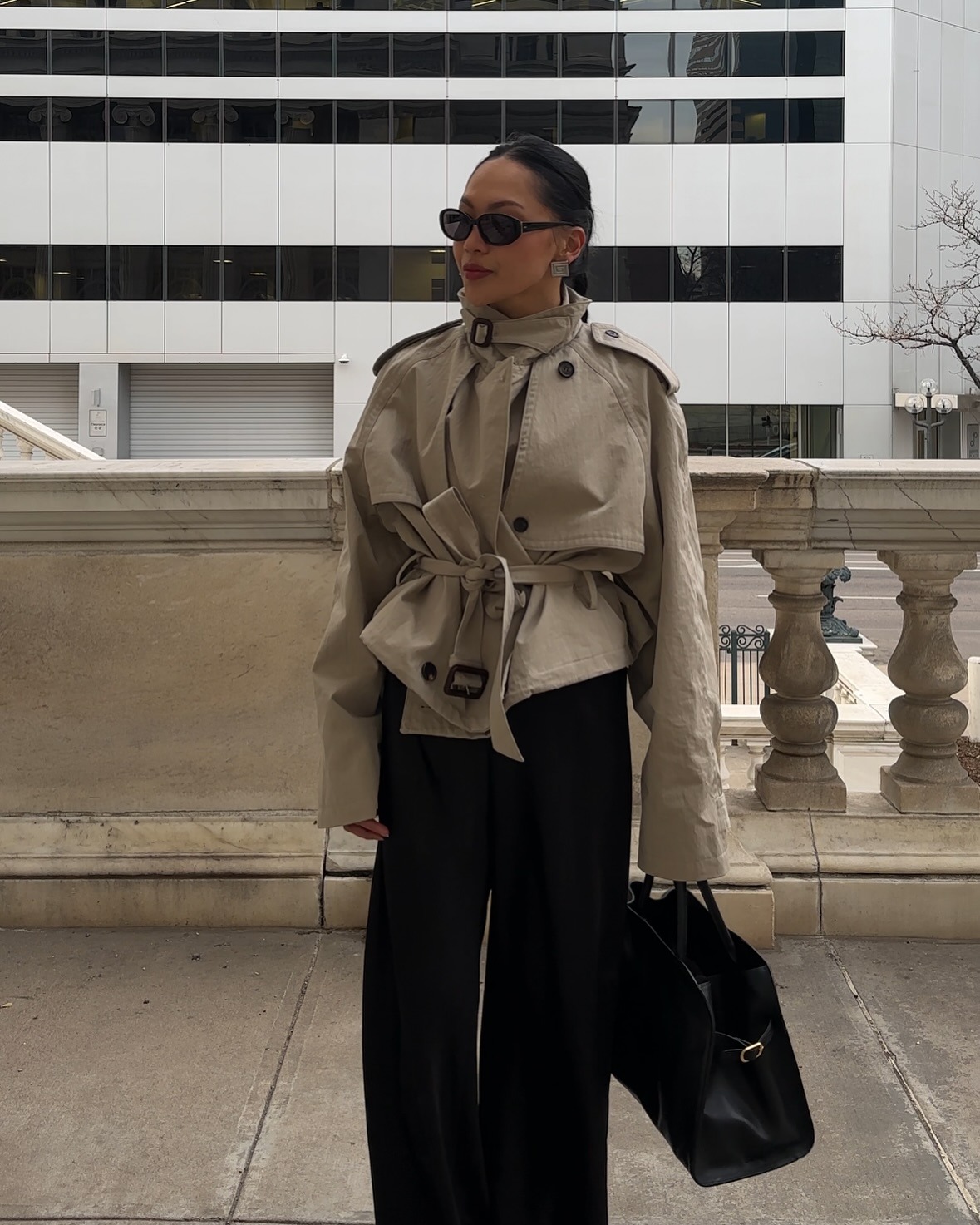 @dawn.tan wearing the cropped trench coat trend