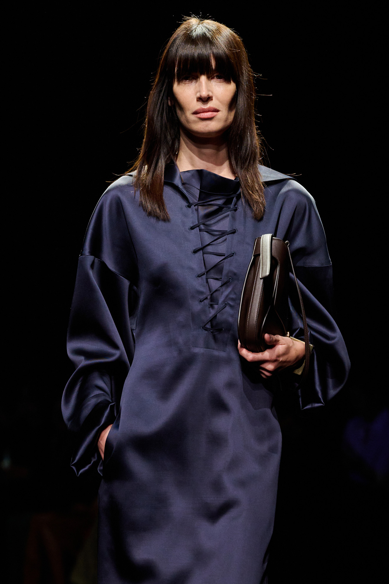 a model walks the ferragamo fall/winter 2026 show.