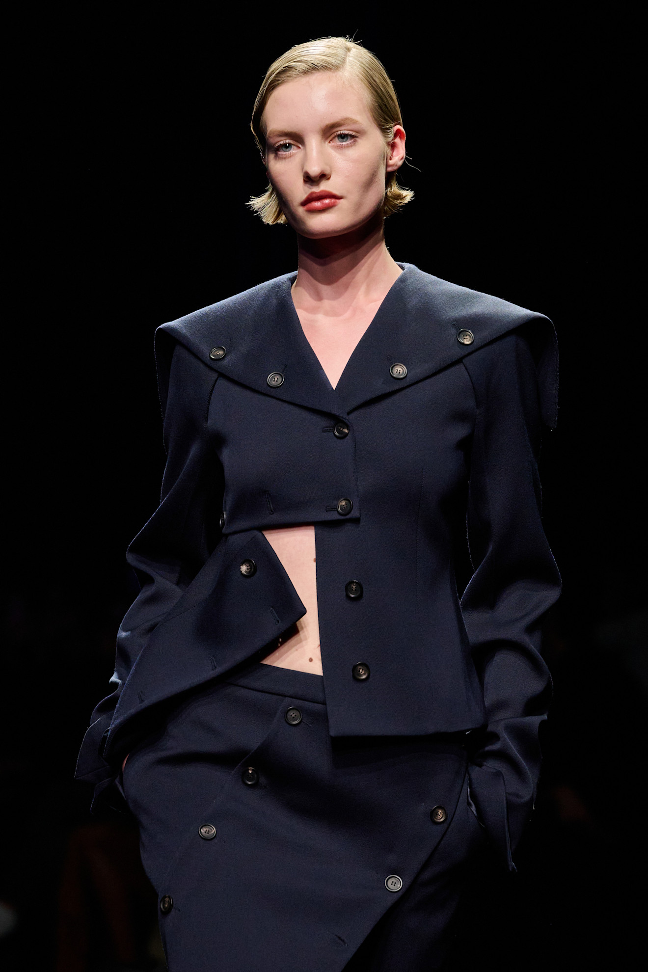 a model walks the ferragamo fall/winter 2026 show.