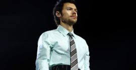 Harry Styles Channels Action Star Fantasy in “American Girls” Music Video