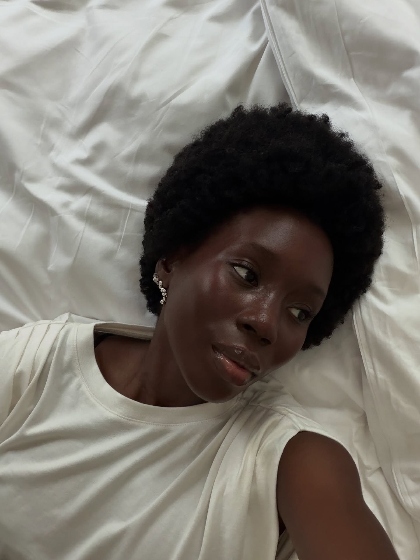 Danielle Jinadu with an even, glowy complexion