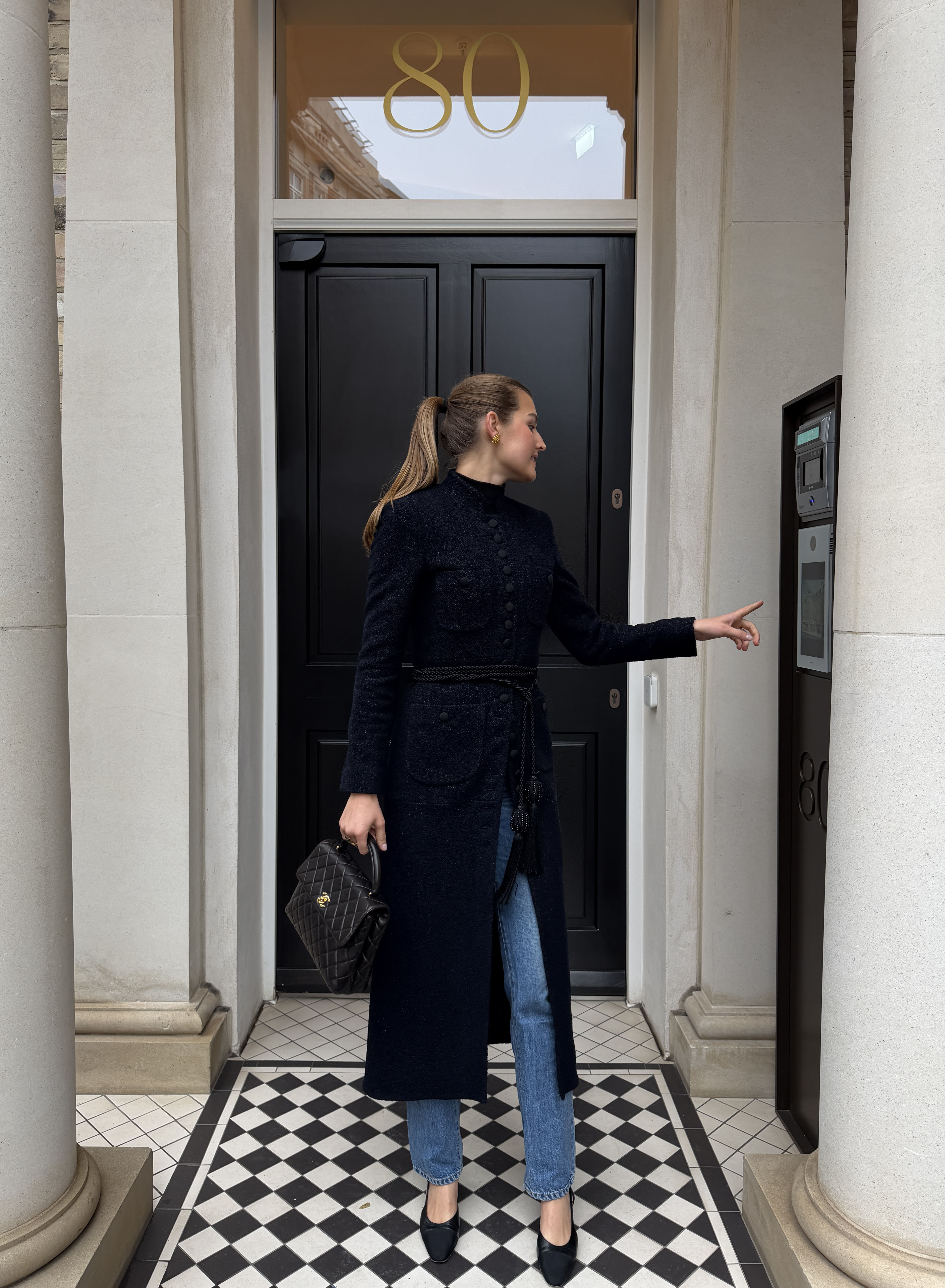Sara Walker in Liberowe coat and jeans