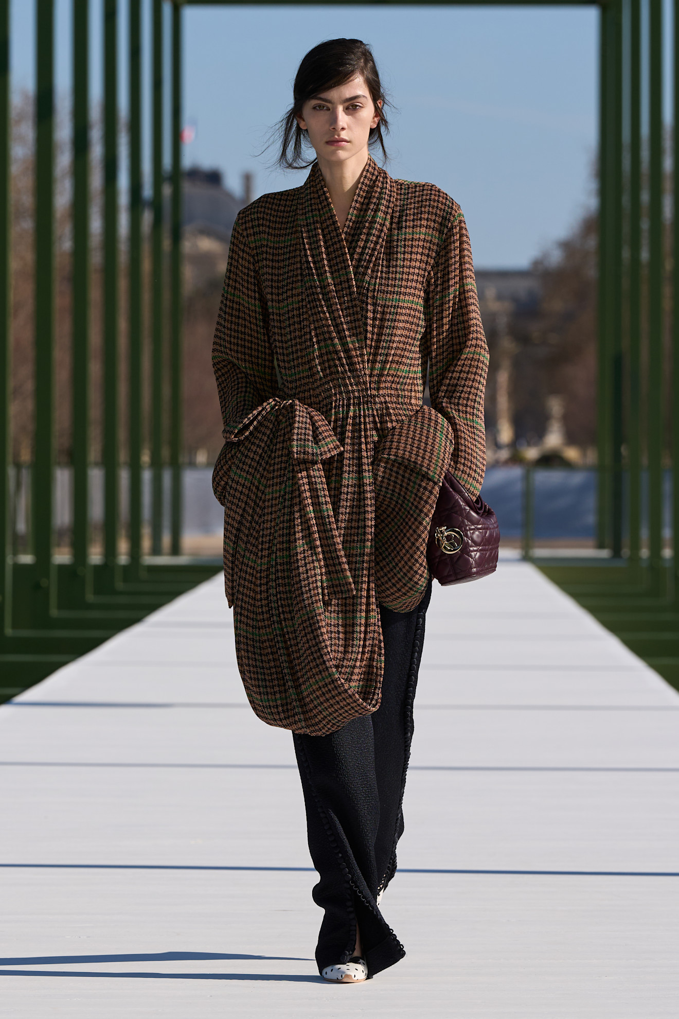 Photos of models at Paris Fashion Week Fall Winter 2026 wearing basque waist trend.