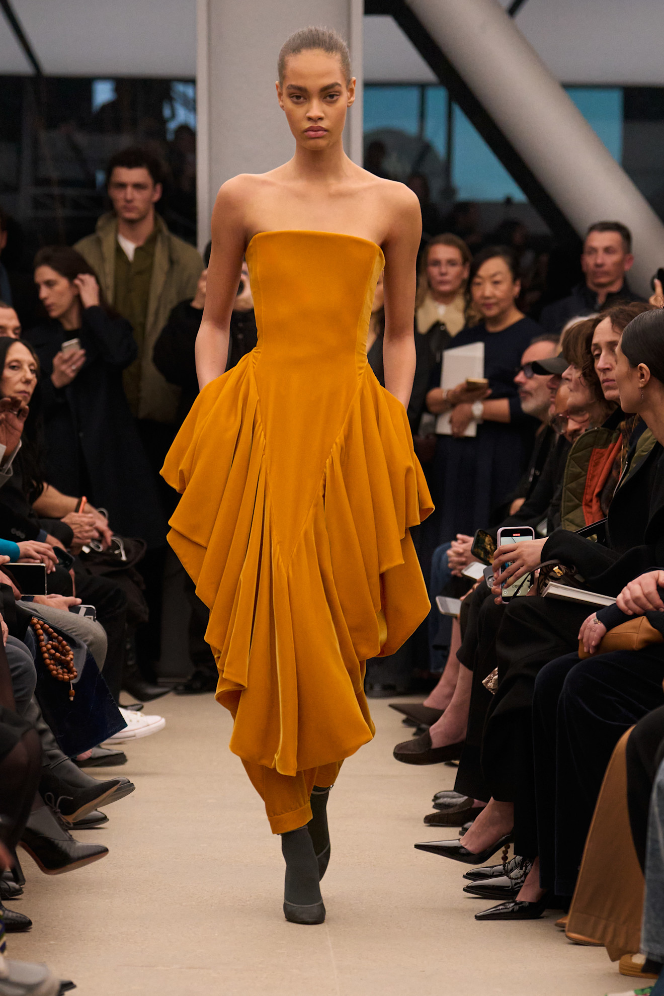 Photo of model wearing basque waist trend during Paris Fashion Week Fall Winter 2026 runway show.