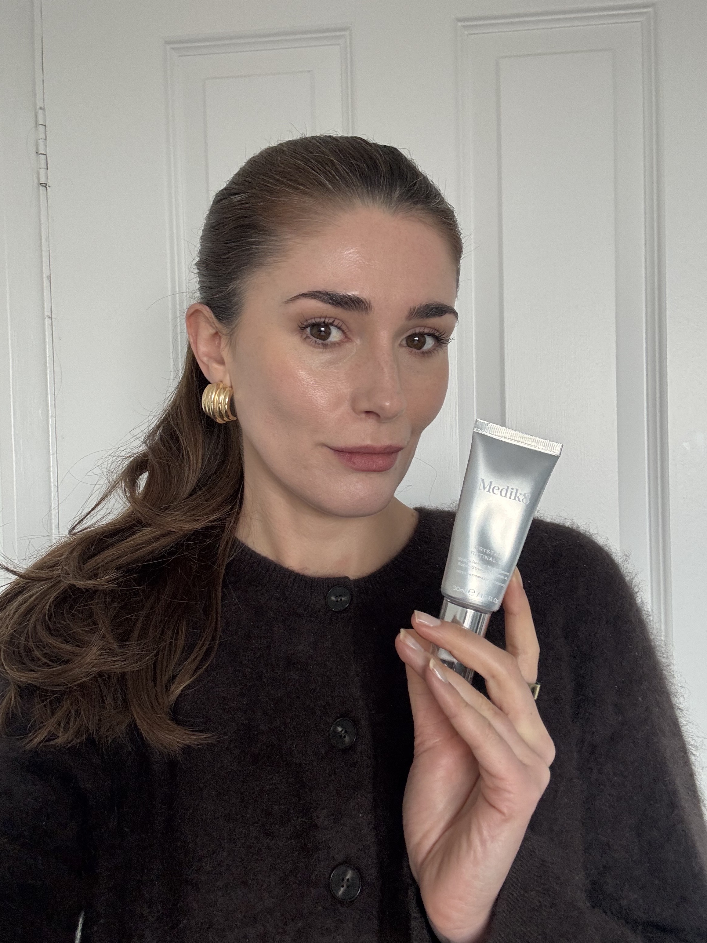 Eleanor with her tube of Medik8 Crystal Retinal in strength 6