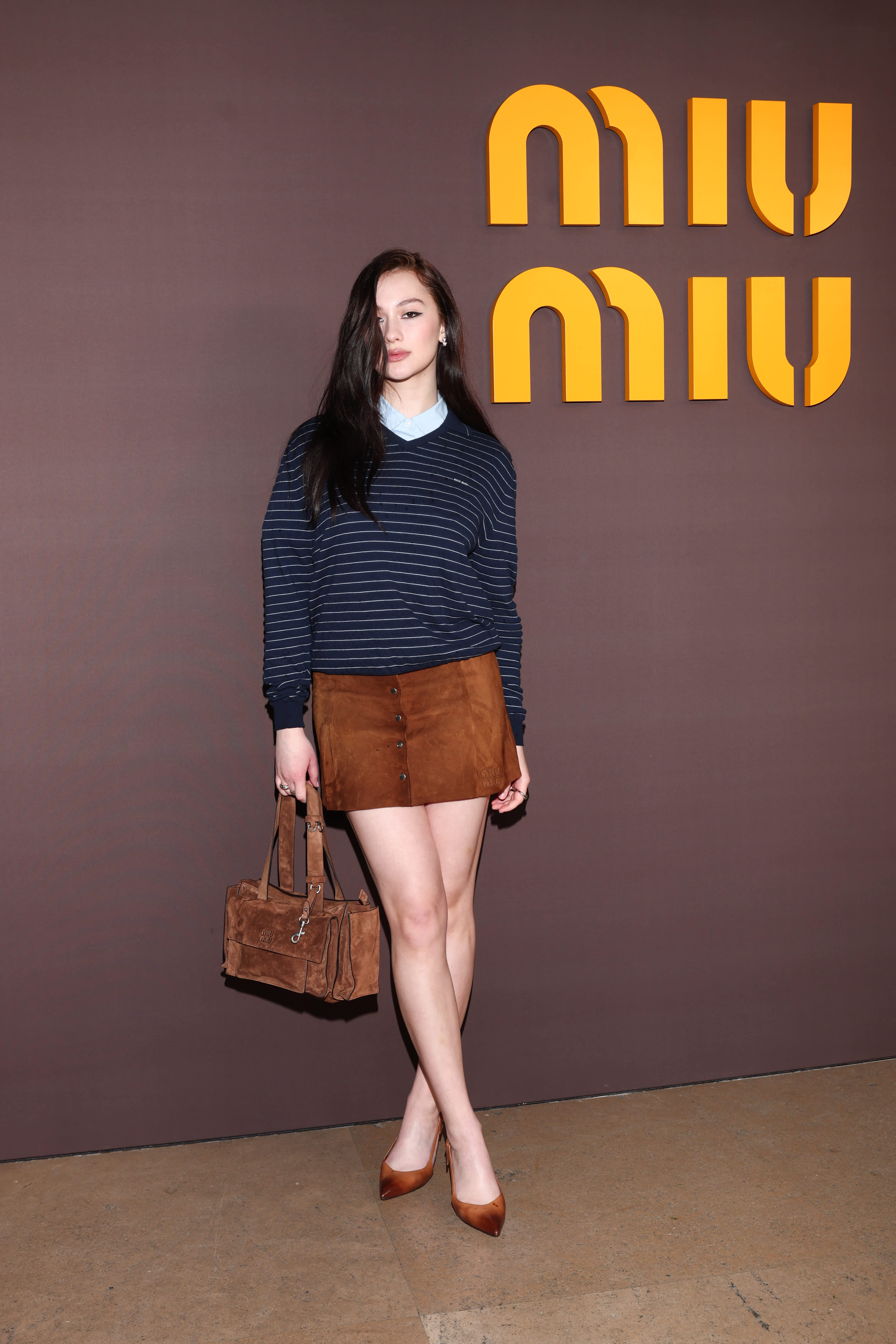 Lola Tung attends the Miu Miu show in Paris