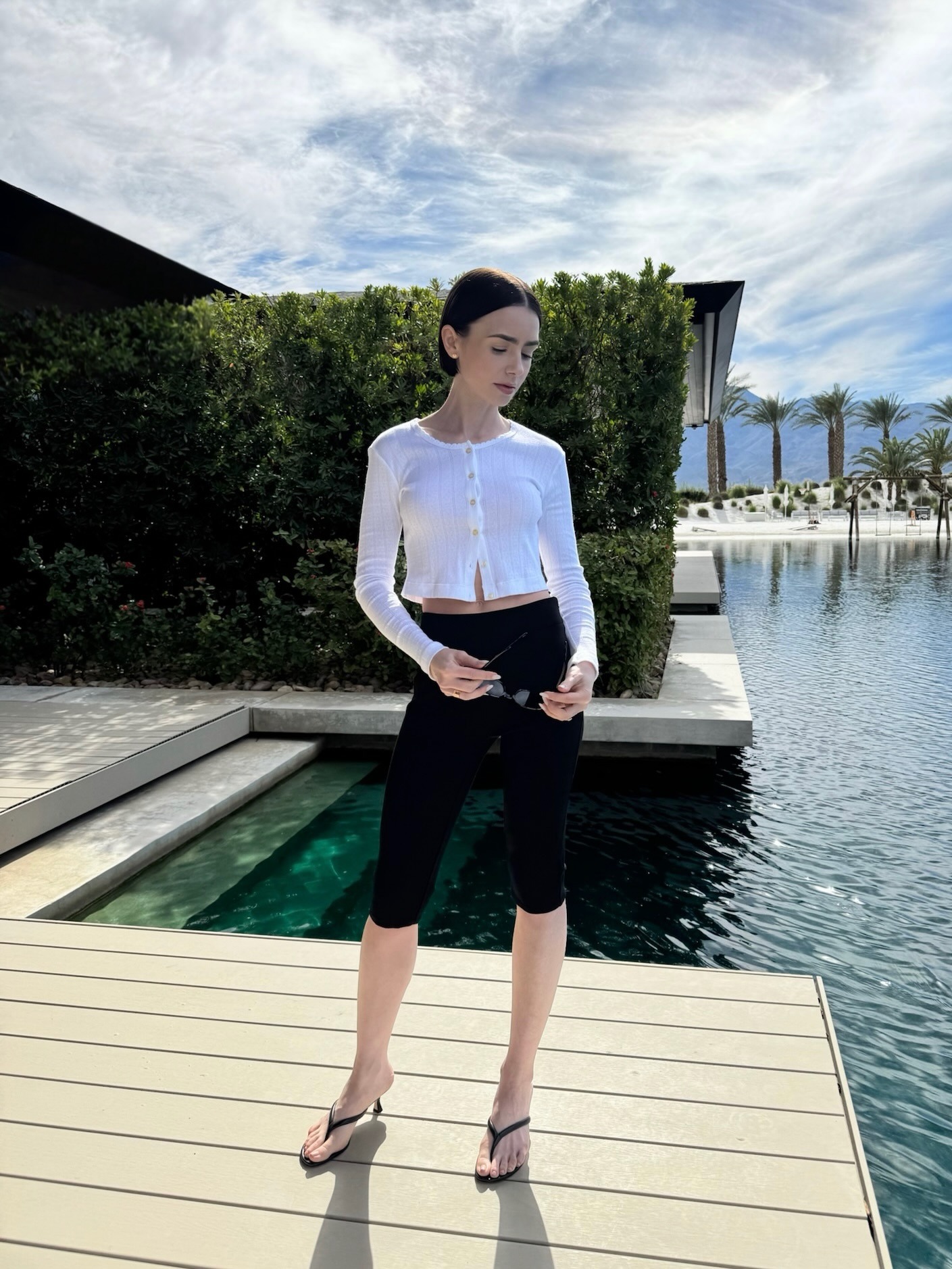 Lily Collins wears capri pants