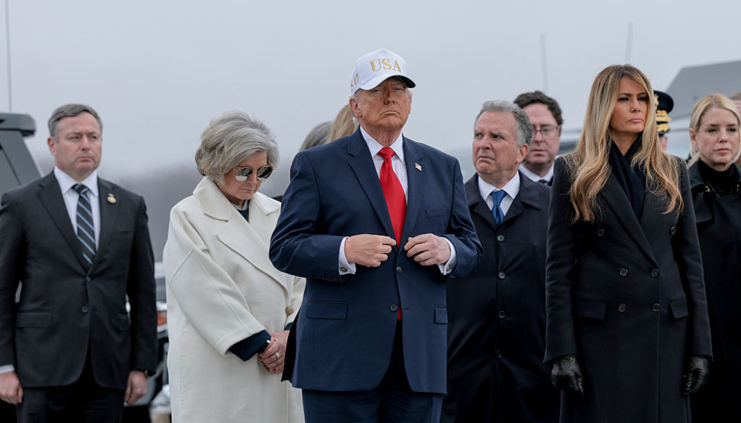 Not So Dignified: Donald Trump Dragged For Wearing His Tacky USA Hat During Ceremony Honoring Six Fallen Soldiers