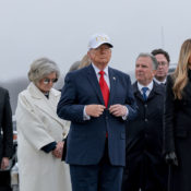 Not So Dignified: Donald Trump Dragged For Wearing His Tacky USA Hat During Ceremony Honoring Six Fallen Soldiers