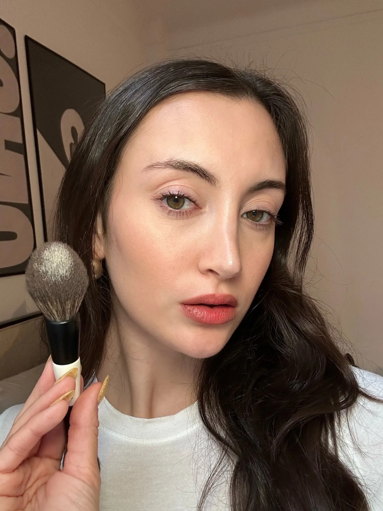 WWW associate beauty editor Alyssa Brascia wearing loose setting powder.