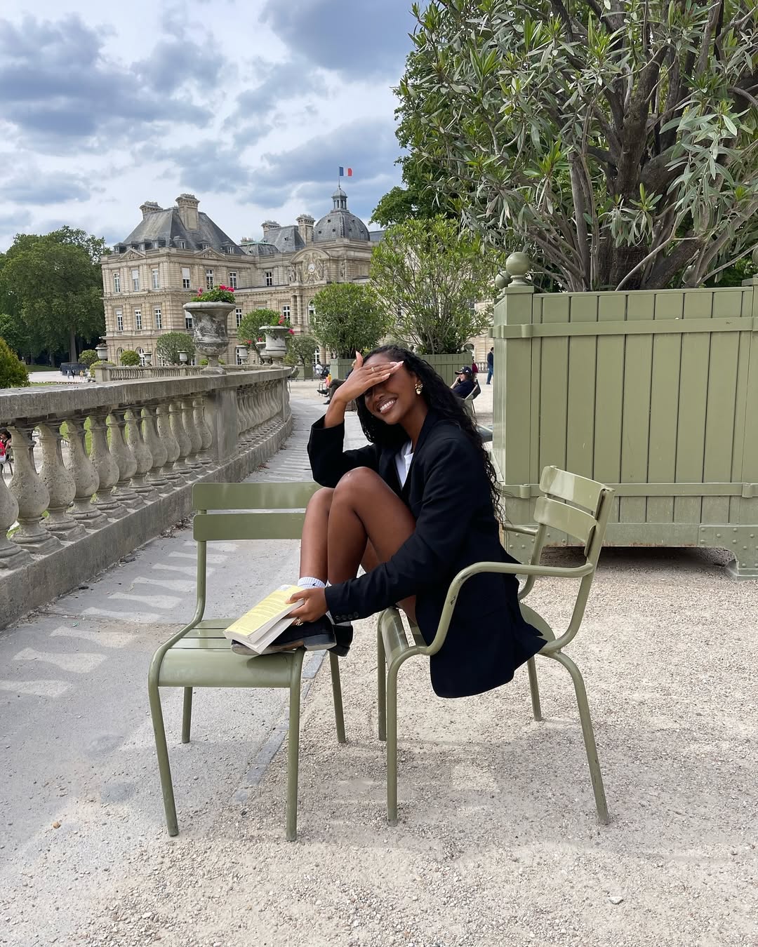 Rayan Xasan with glowing skin and wavy hair.