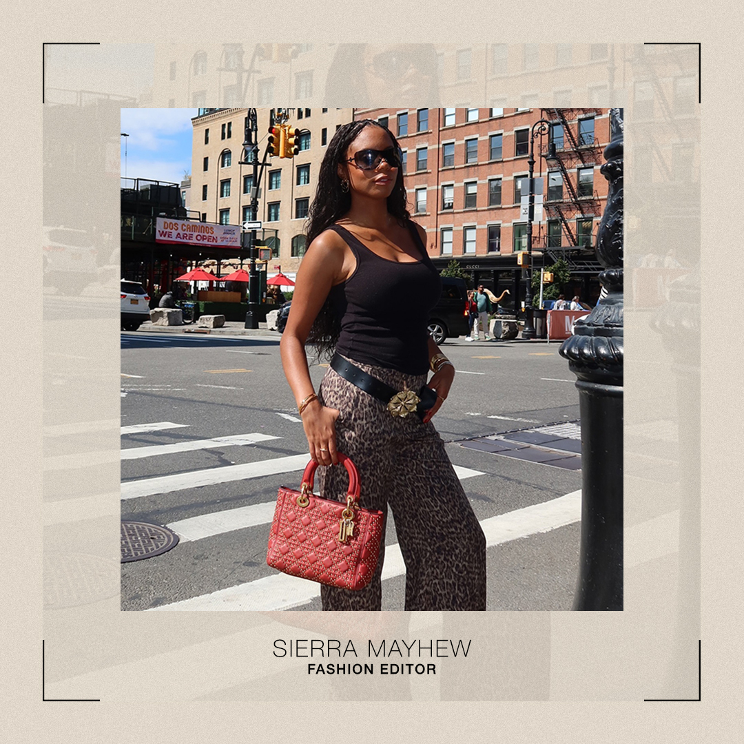a photo of sierra with a red dior bag and cheetah pants.