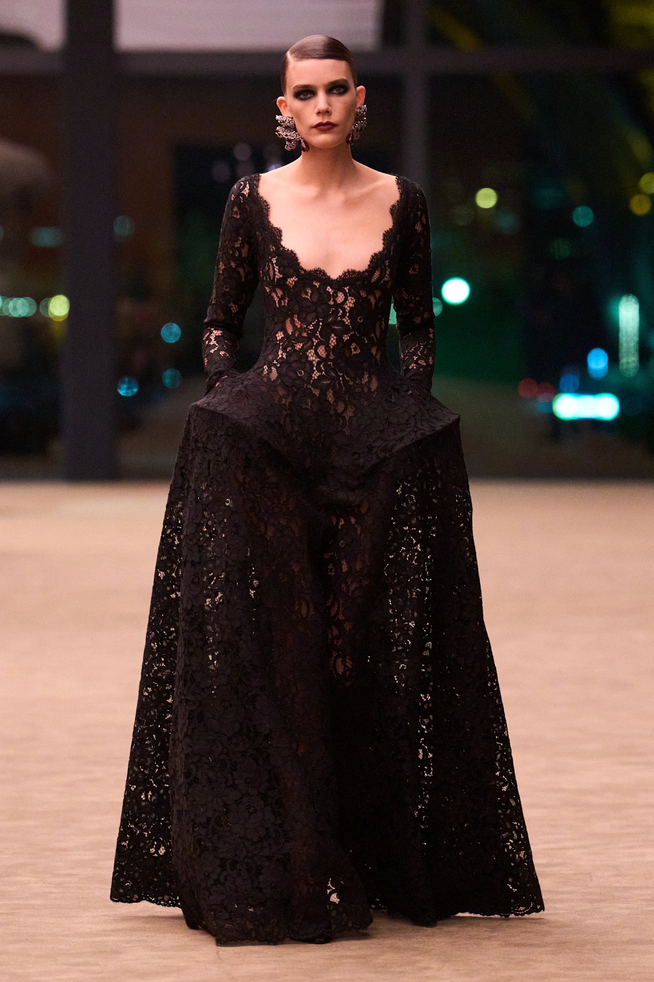 a model walks the saint laurent f/w 26 runway.