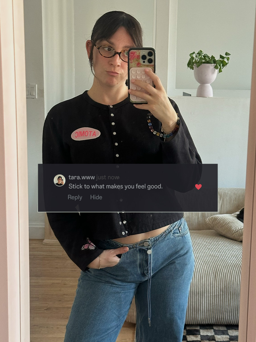 who what wear editor wearing denim posing for a selfie in front of a mirror
