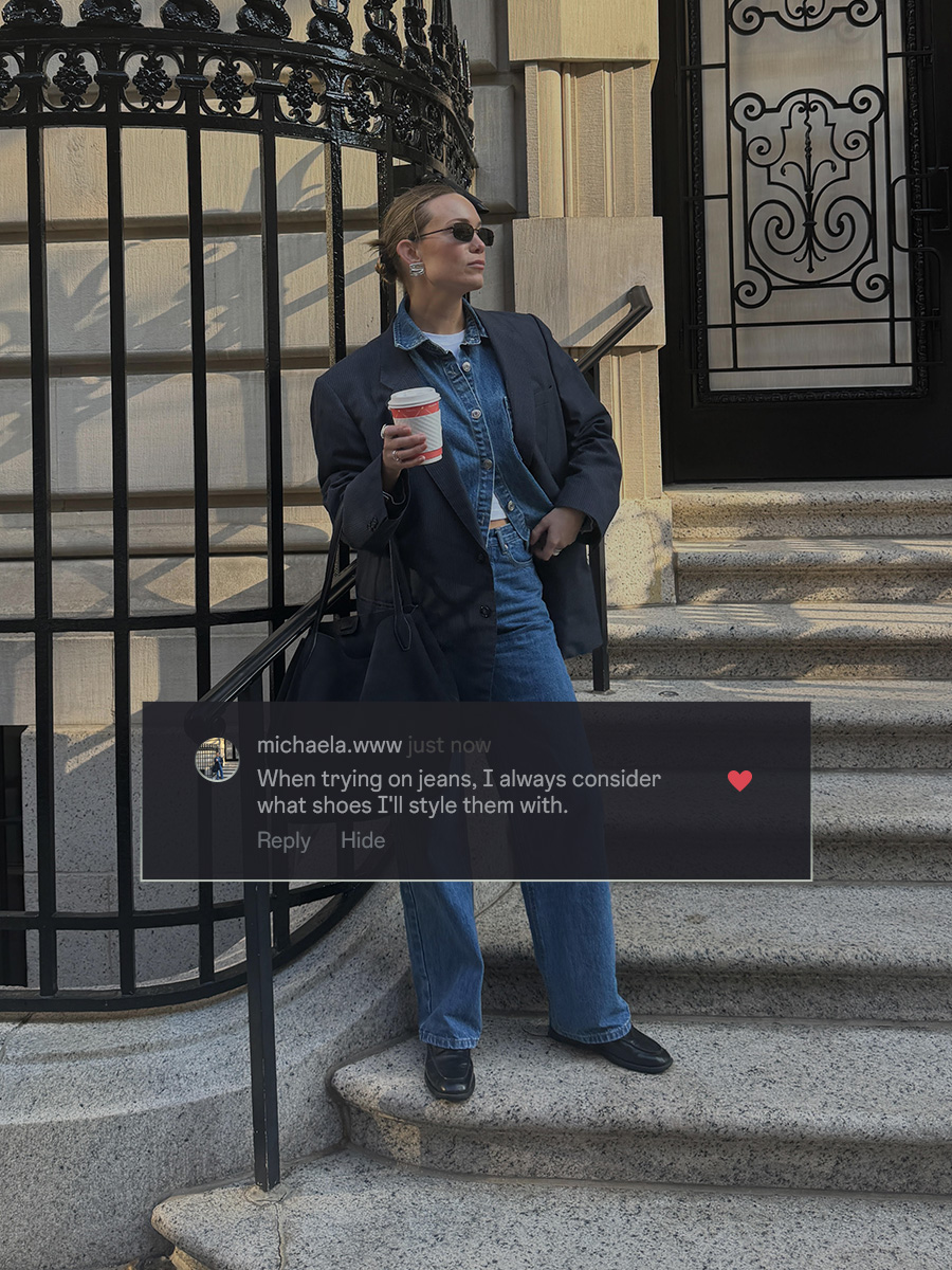 who what wear editors wearing blue denim on an apartment stoop holding a cup of coffee