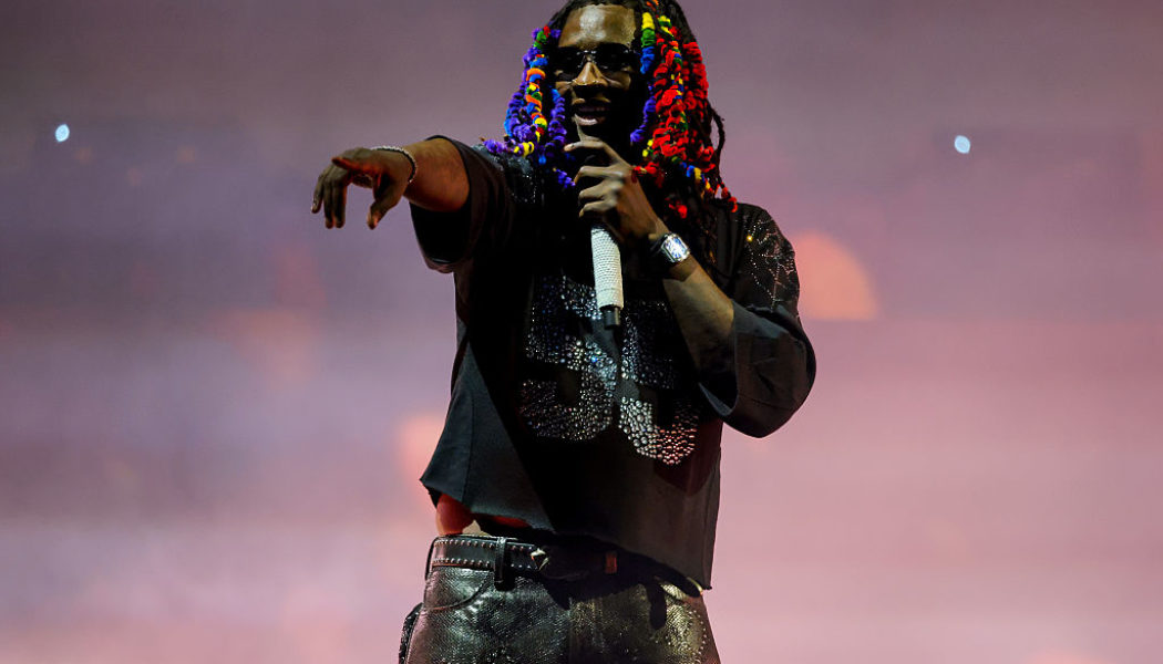 6ix9ine Trolls Young Thug For Biting His Rainbow Hair Look