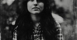 A folk musician became a target for AI fakes and a copyright troll