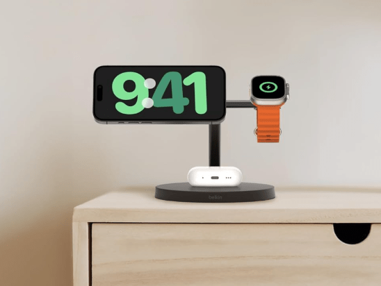 Belkin’s 3-in-1 Qi2 charging station charging a phone, smartwatch, and wireless earbuds.
