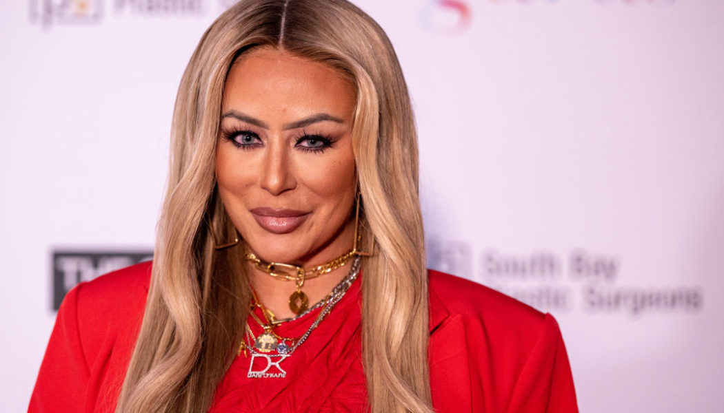 Aubrey O’Day Claps Back At Trolls Over Kanye West Concert Appearance