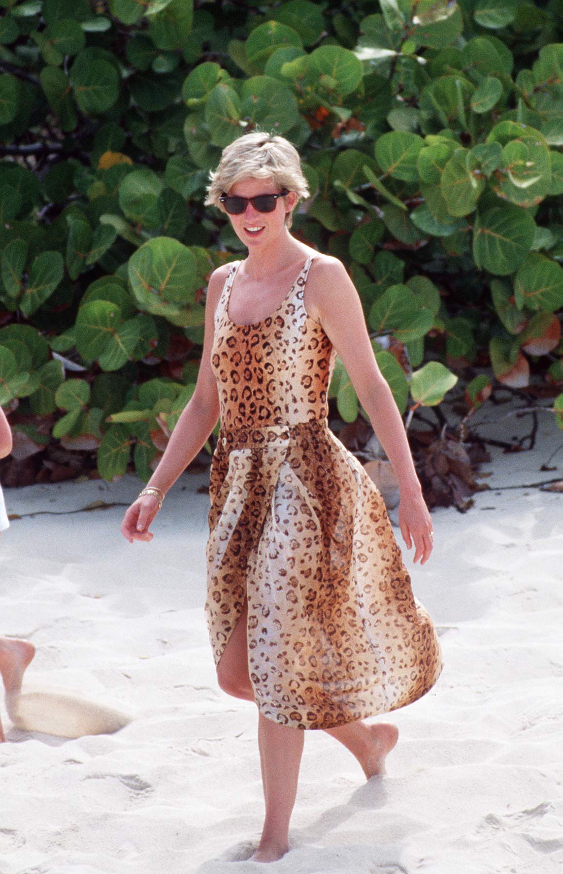 Princess Diana wears a leopard swimsuit.
