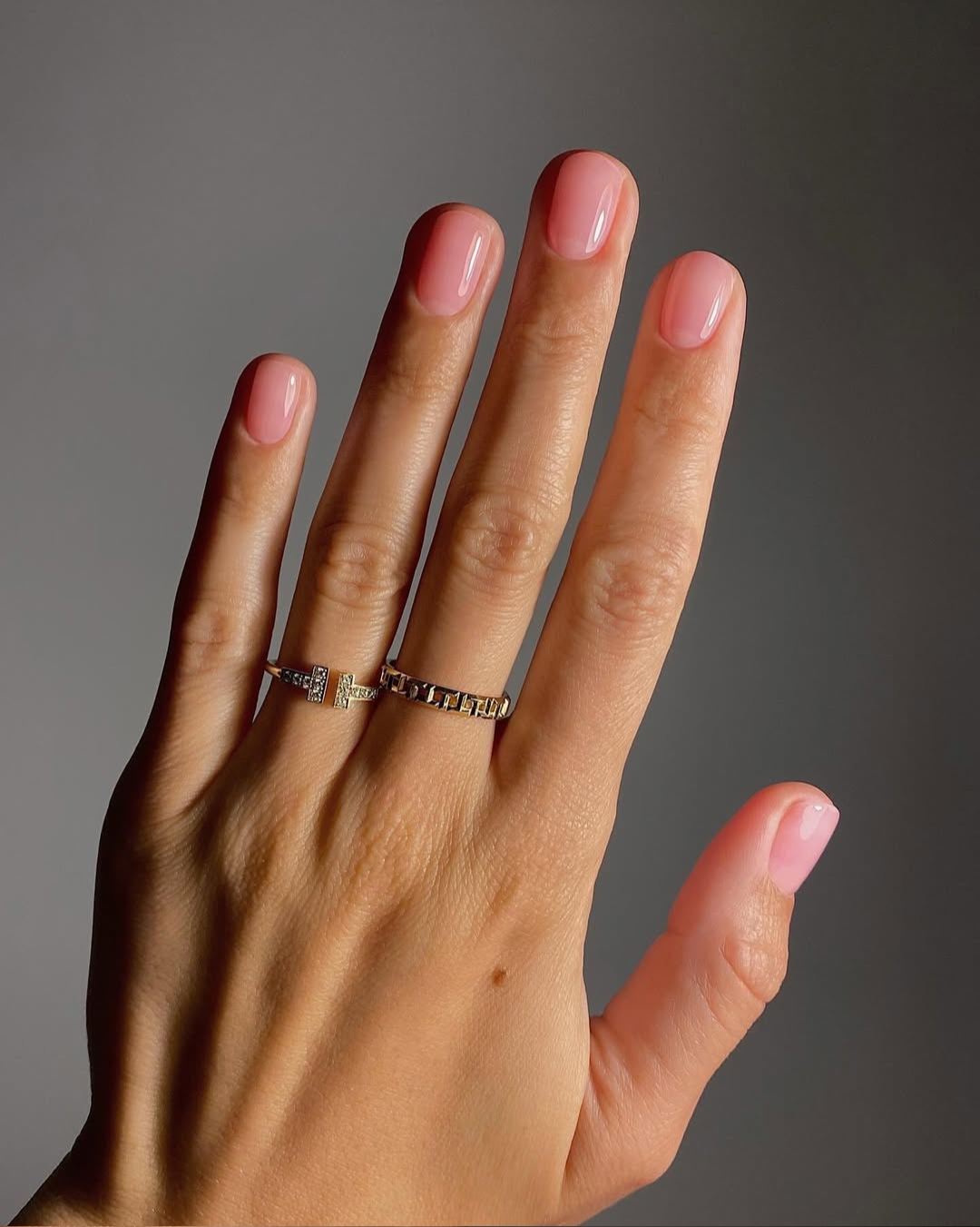 A pink manicure by Mateja Novakovic