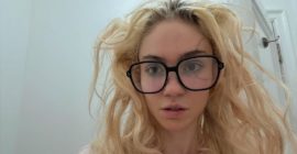 Grimes Calls AI “Bigger Than Jesus” and “Most Dangerous Thing That’s Ever Going to Happen”