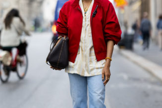 *Not* Sandals—the Anti-Spring Shoe Every Chic Dresser in Milan Is Wearing With Light-Wash Jeans