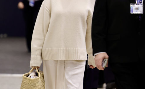 Pamela Anderson’s Airport Look Includes the French-Girl Shoe and Bag Combo I Actually Recommend Travelling With