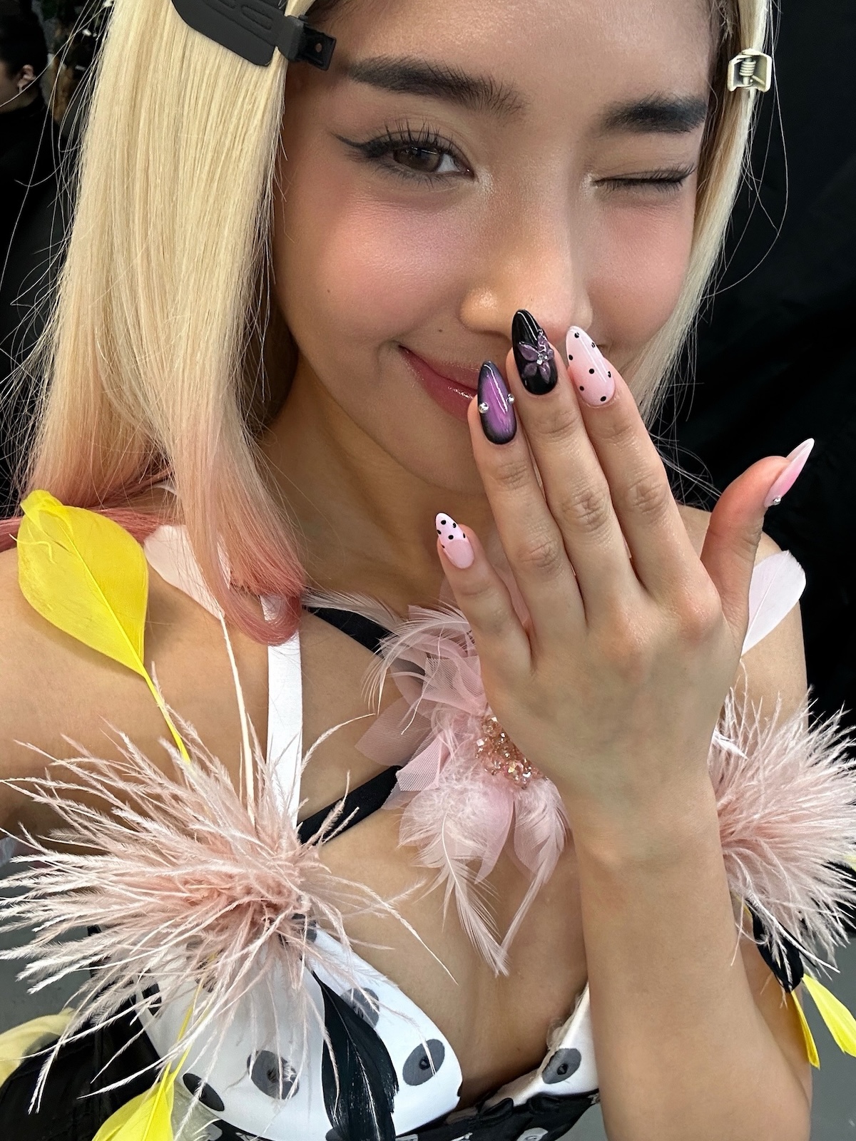 Katseye bedazzled nails.