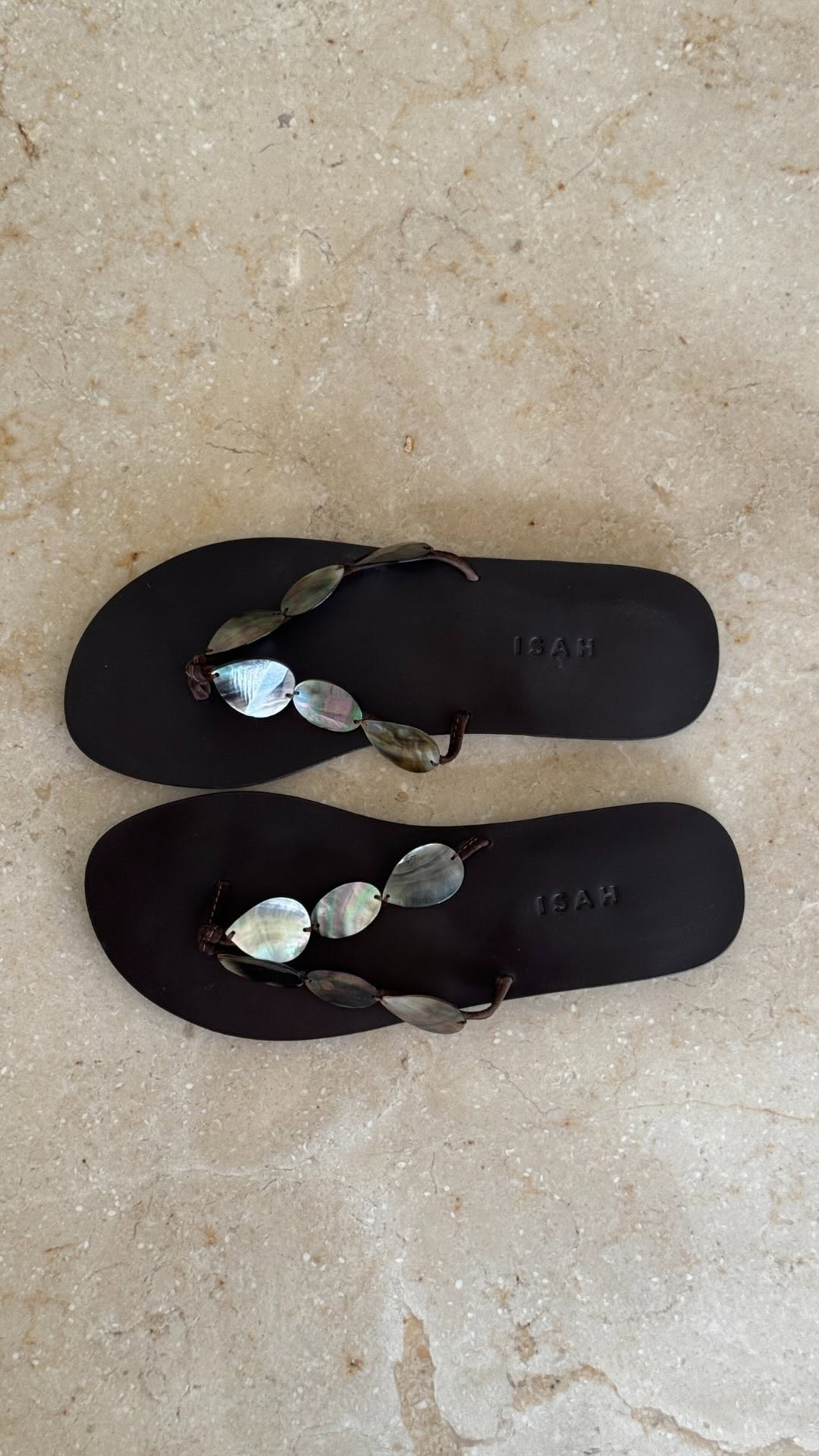 Image of shell flip-flops sandals.