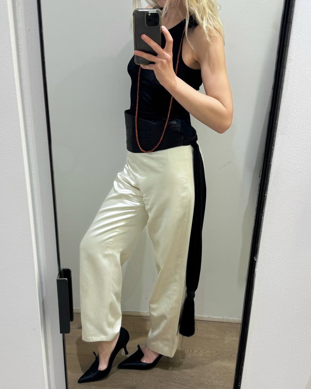 influencer wearing a designer statement accessory