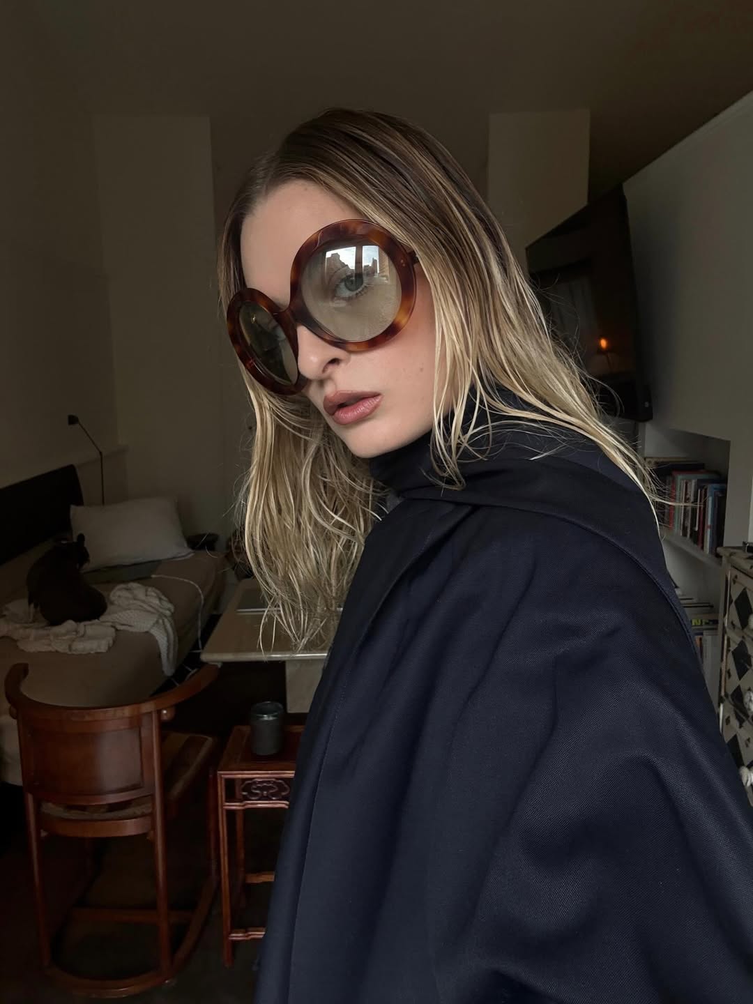 influencer wearing a designer statement accessory